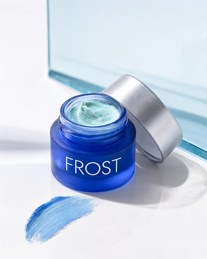 AI-generated beauty packaging concept: Denim. Blue cream eye color. A hazy wash of blue.